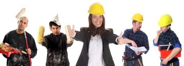 businesswoman with successful construction workers on white background